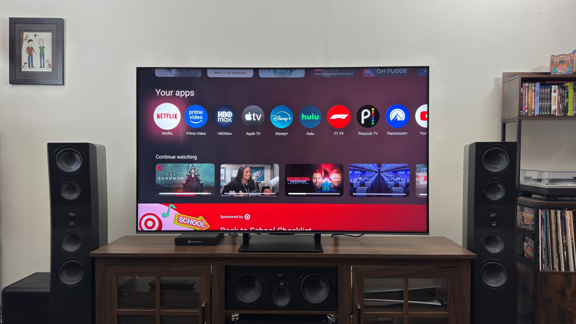 Hisense U75QG showing Google TV interface on screen