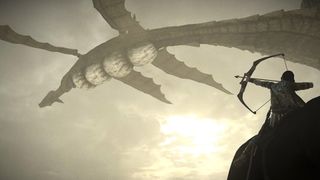 The protagonist of Shadow of the Colossus aims a bow at a giant flying creature as sunlight shines down from above
