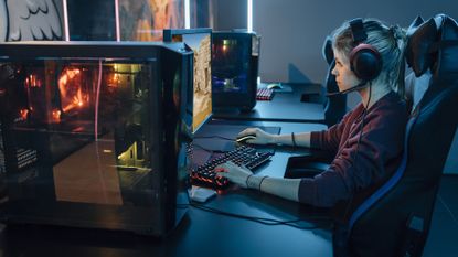 Professional gamer playing esports on gaming station