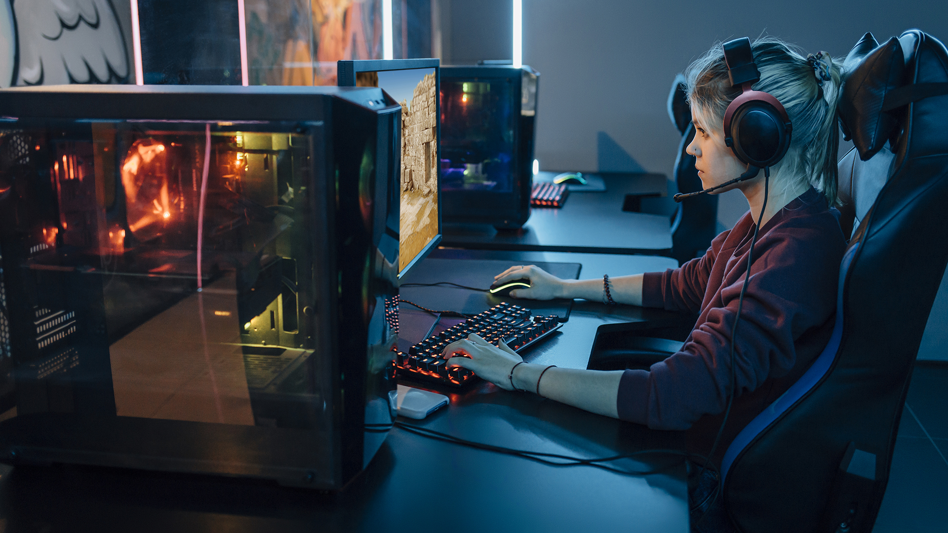 Professional gamer playing esports on gaming station