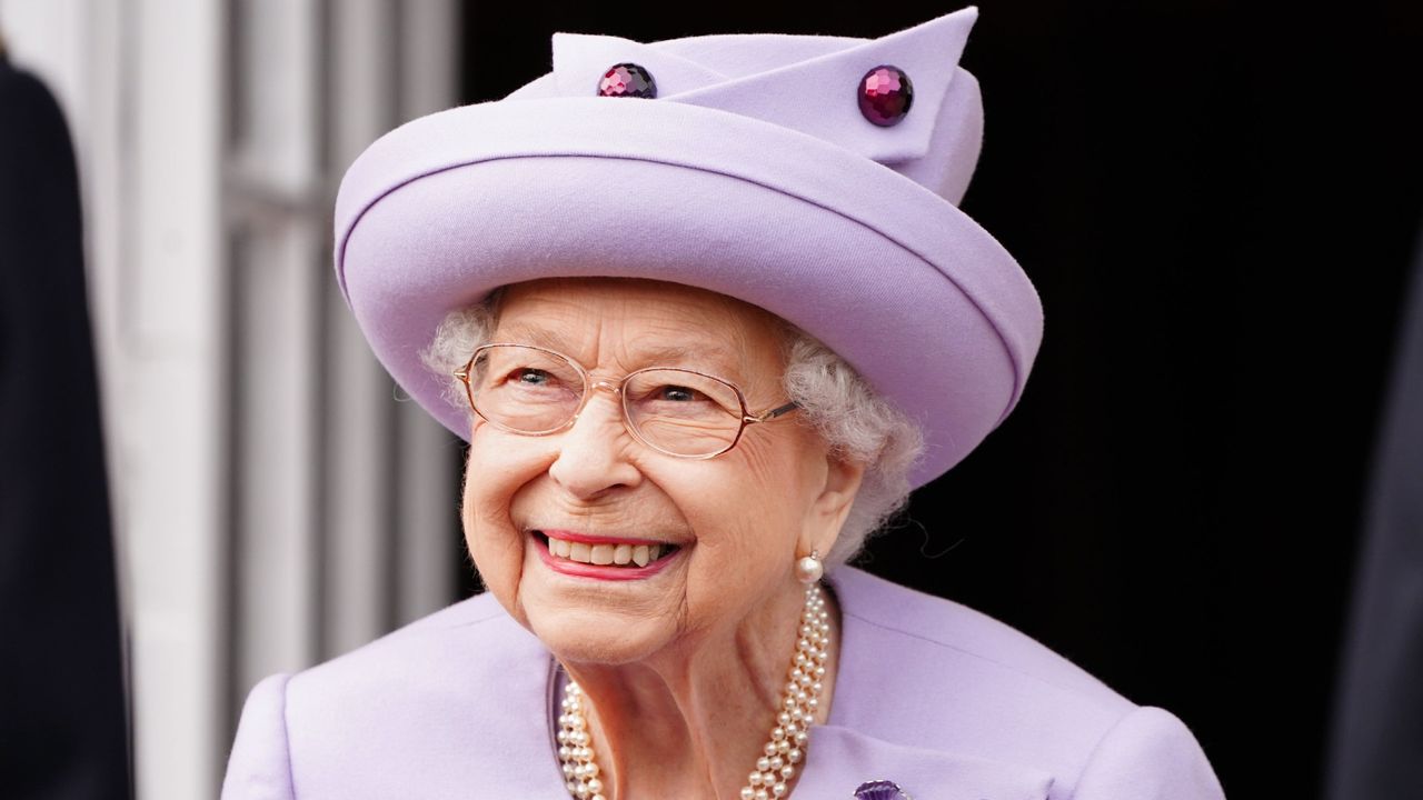 Queen Elizabeth II attends an Armed Forces Act of Loyalty Parade