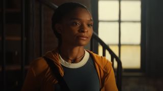 Riri Williams (Dominique Thorne) talks to Parker Robbins on Ironheart