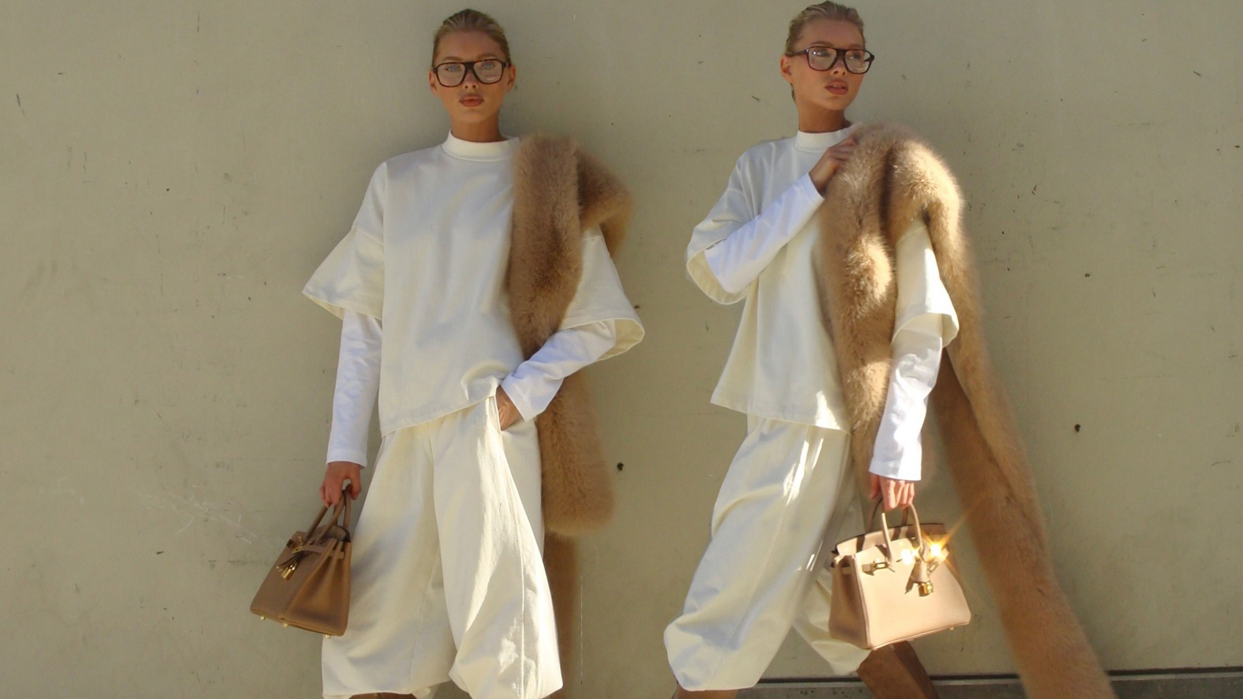 Elsa Hosk wearing a butter yellow sweatshirt and sweatpants with tan boots, a tan fur scarf, and a tan Birkin bag.