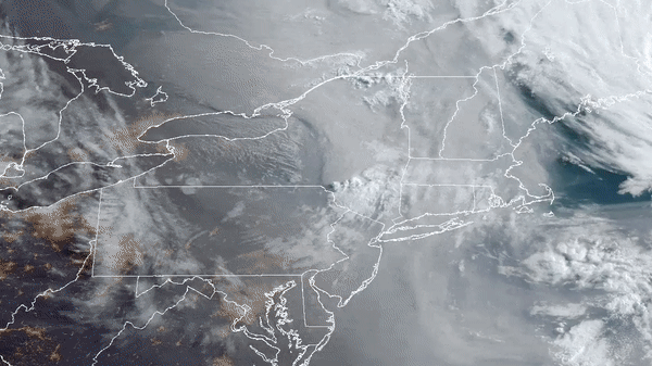 A giant cloud of toxic smoke from wildfires in Canada is spreading across the U.S. northeast in this image sequence taken by the U.S. weather forecasting satellite GOES East.