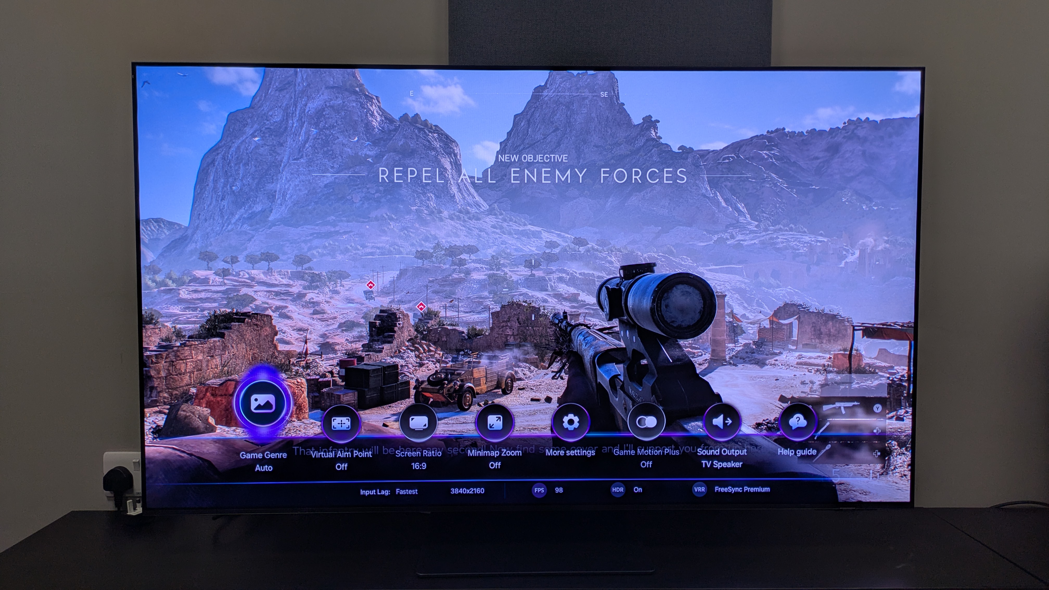 Samsung S95F with Battlefield V and game bar on screen