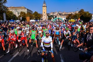 Alejando Valverde is front and center in his rainbow jersey before the start of Il Lombardia
