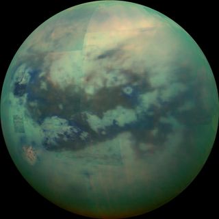 An infrared view of Saturn’s largest moon, Titan, peers through its haze.