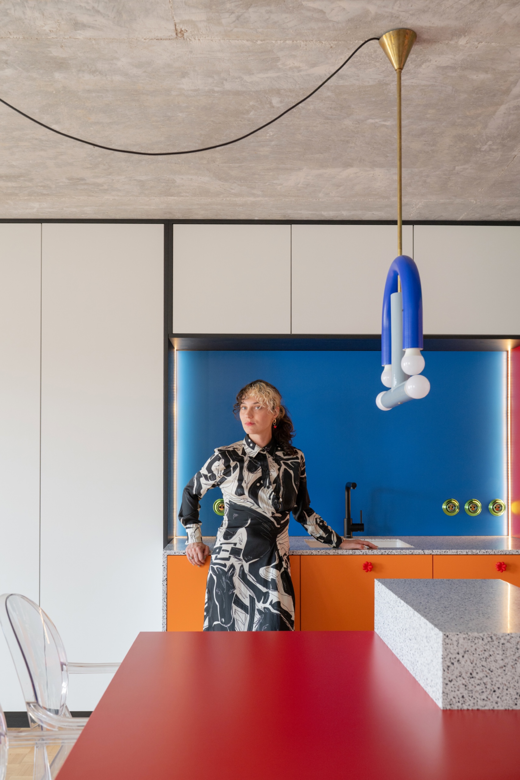Designer in her client's kitchen