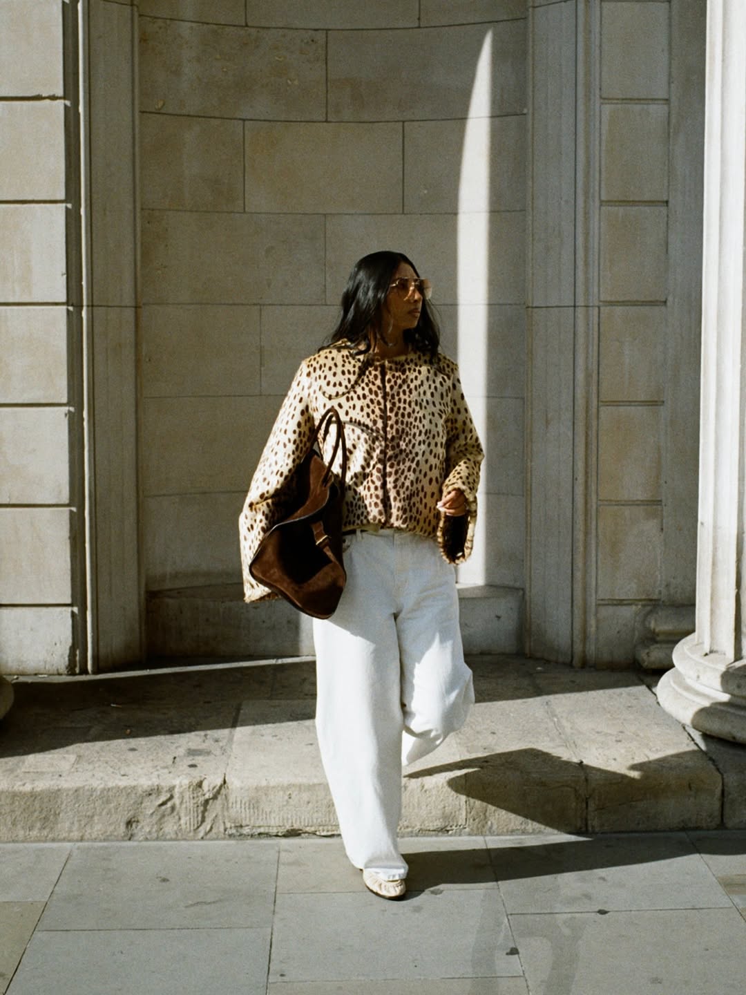 Woman wearing wide-leg jeans paired with a denim jacket