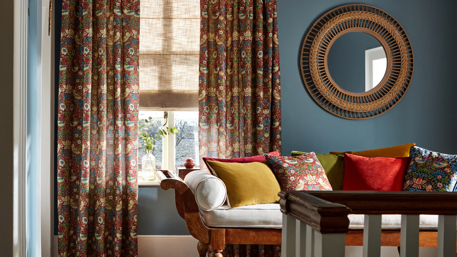 Chintz curtains and blue walls