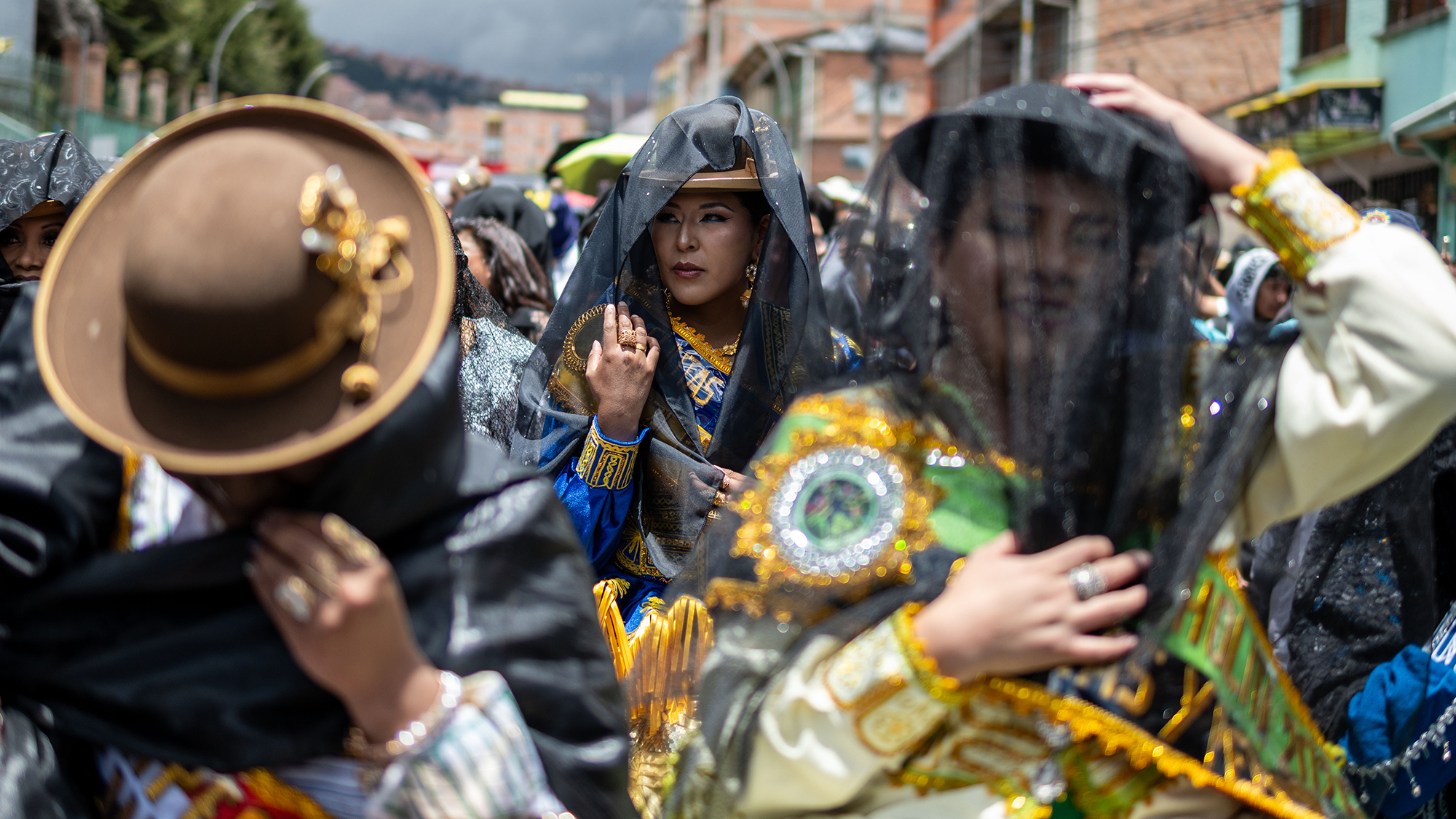 Revellers celebrate the beginning of carnival with the resurrection of folk character Pepino outside the General Cemetery in La Paz, Bolivia