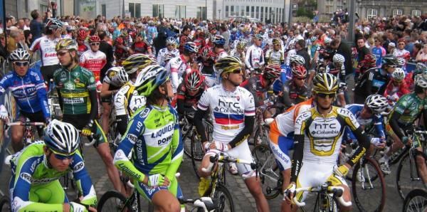The riders look at the sky to see if it going to rain