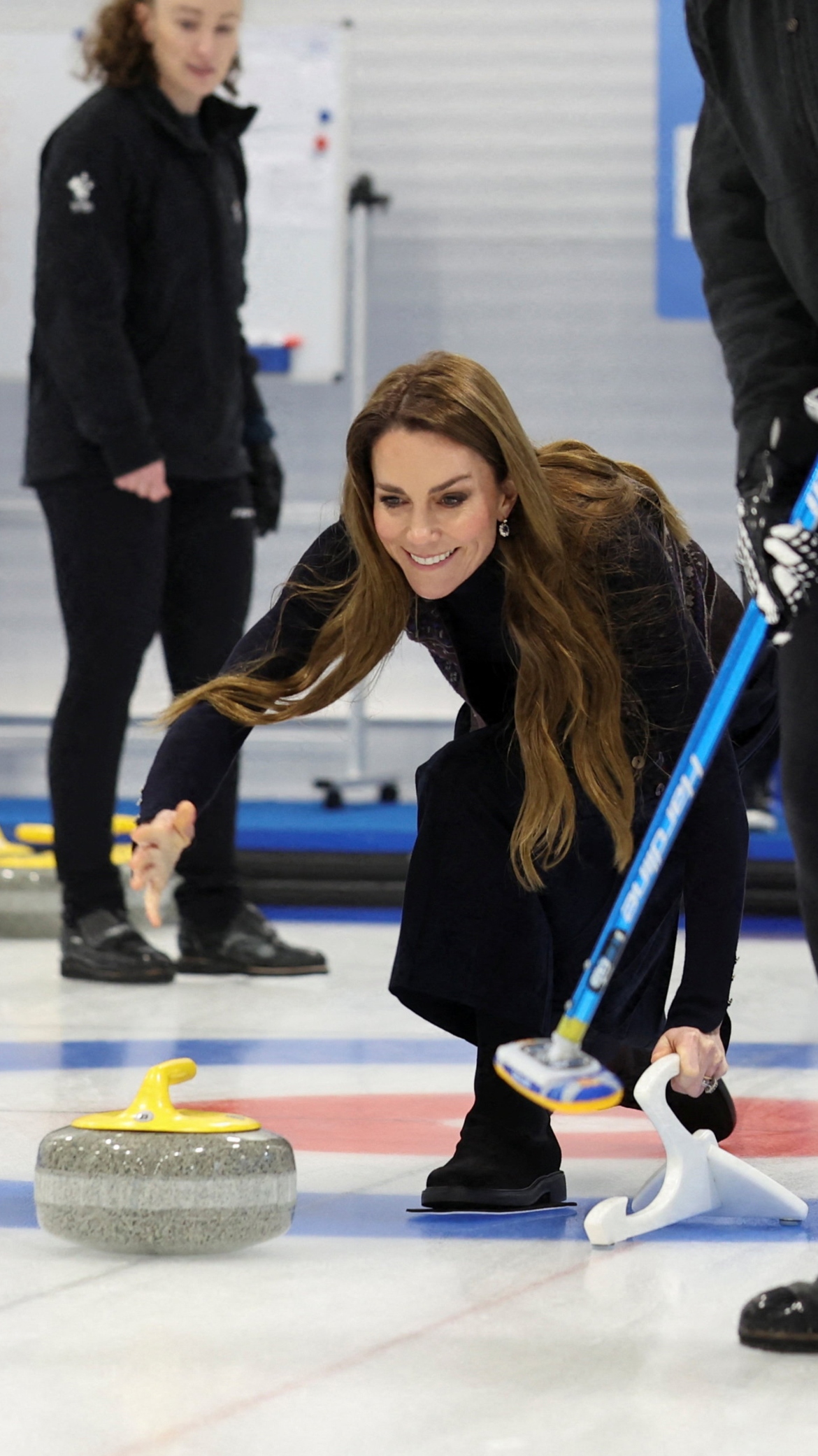 Catherine, Princess of Wales reacts while curling in January 2026