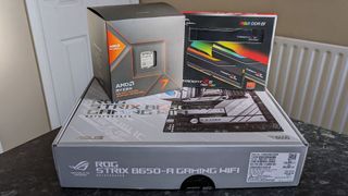 AMD Ryzen 7 8700G boxed with an ASUS AM5 motherboard and G-SKILL DDR5 RAM