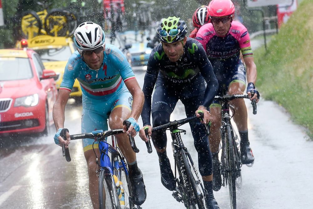 The final leads group rides in the rain.
