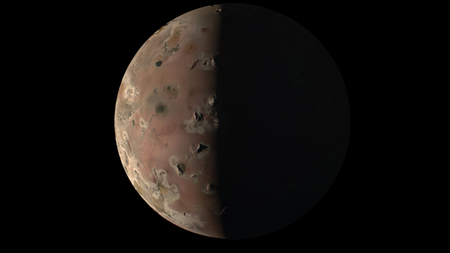 A stunning image of the volcanic moon Io as seen by Juno on Dec. 30, 2023