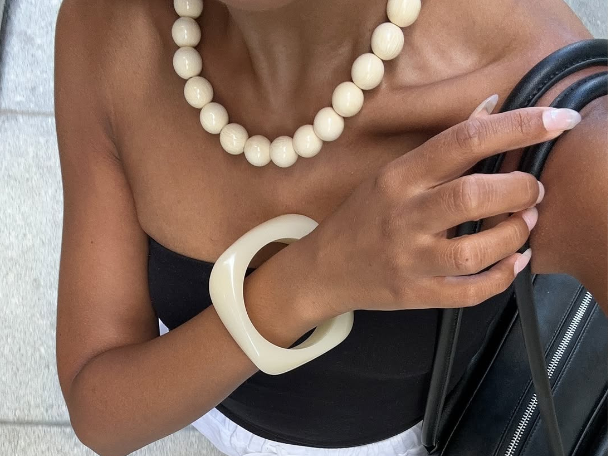 Woman wearing bracelet jewelry trend 2025.