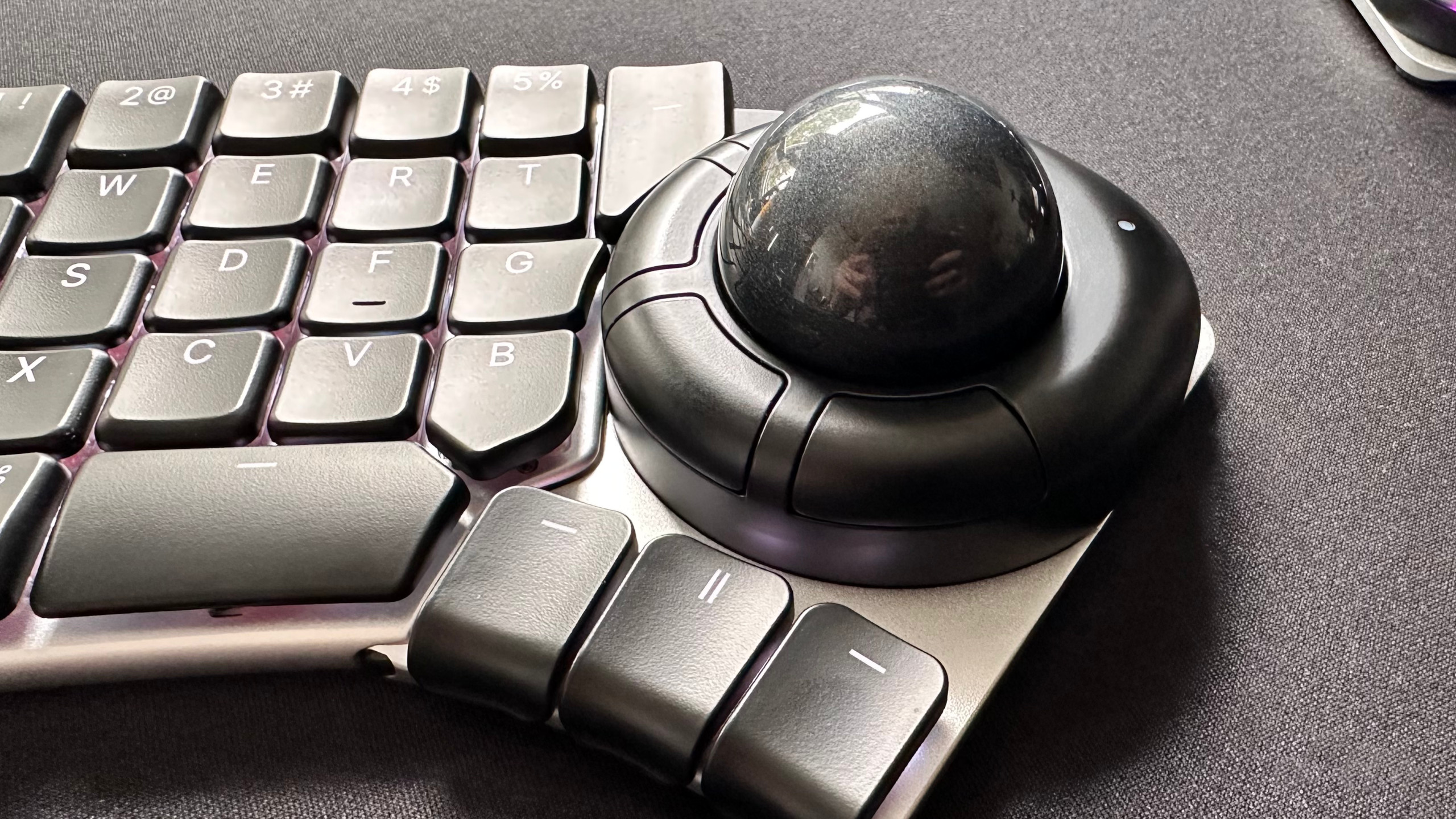 A close-up photo of the Track module for the Naya Create ergonomic keyboard