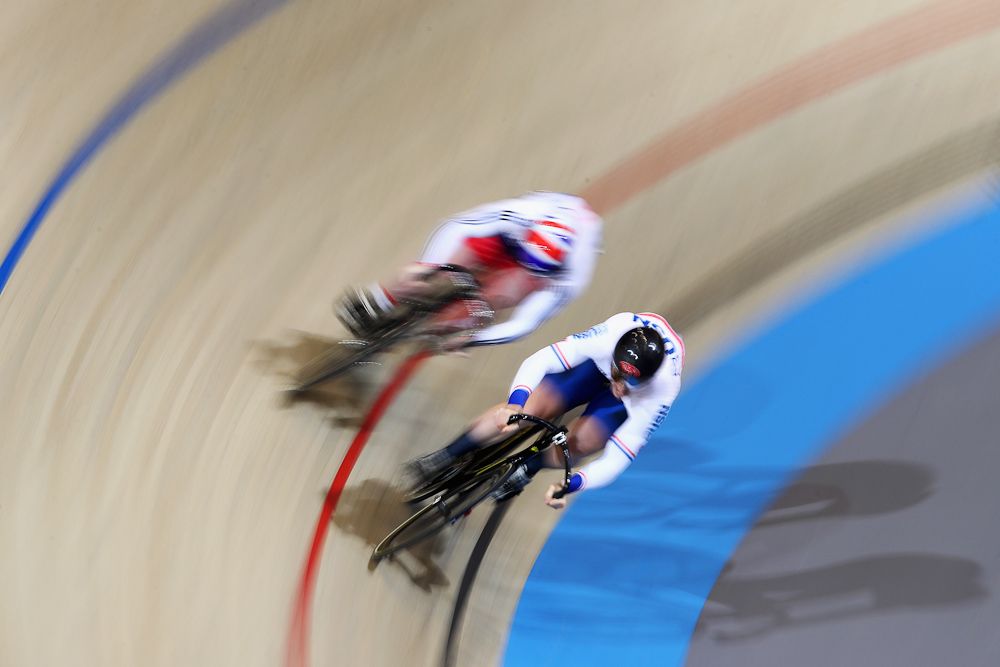 Lewis Oliva (R) and Jack Carlin, both of Great Britain compete in the Men's Sprint 1/8 Finals