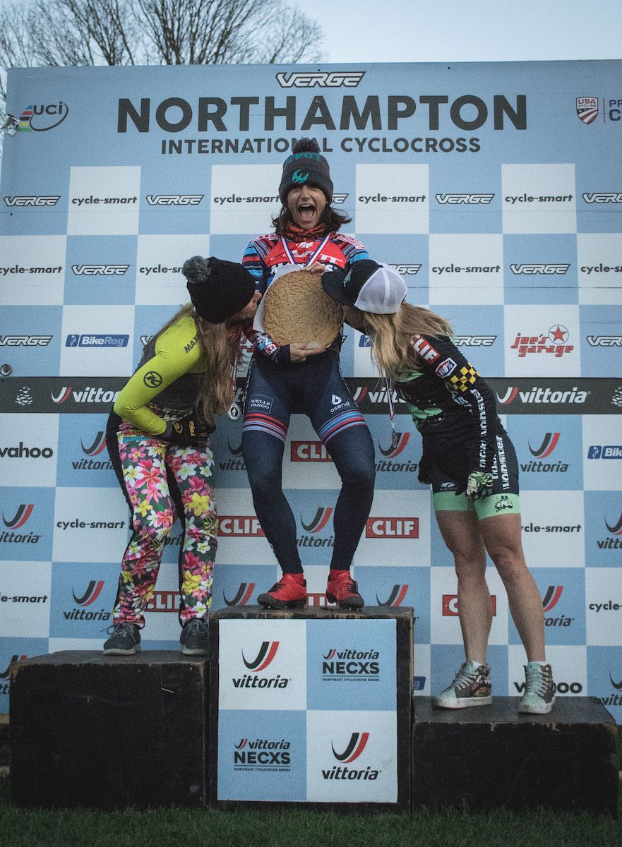 Rebecca Fahringer and Caroline Nolan are envious of Courtenay McFadden's edible prize from winning day 2 of the 2018 NohoCX