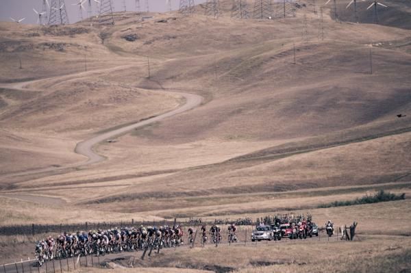 The Amgen Tour of California peloton rides by the Altamont Pass