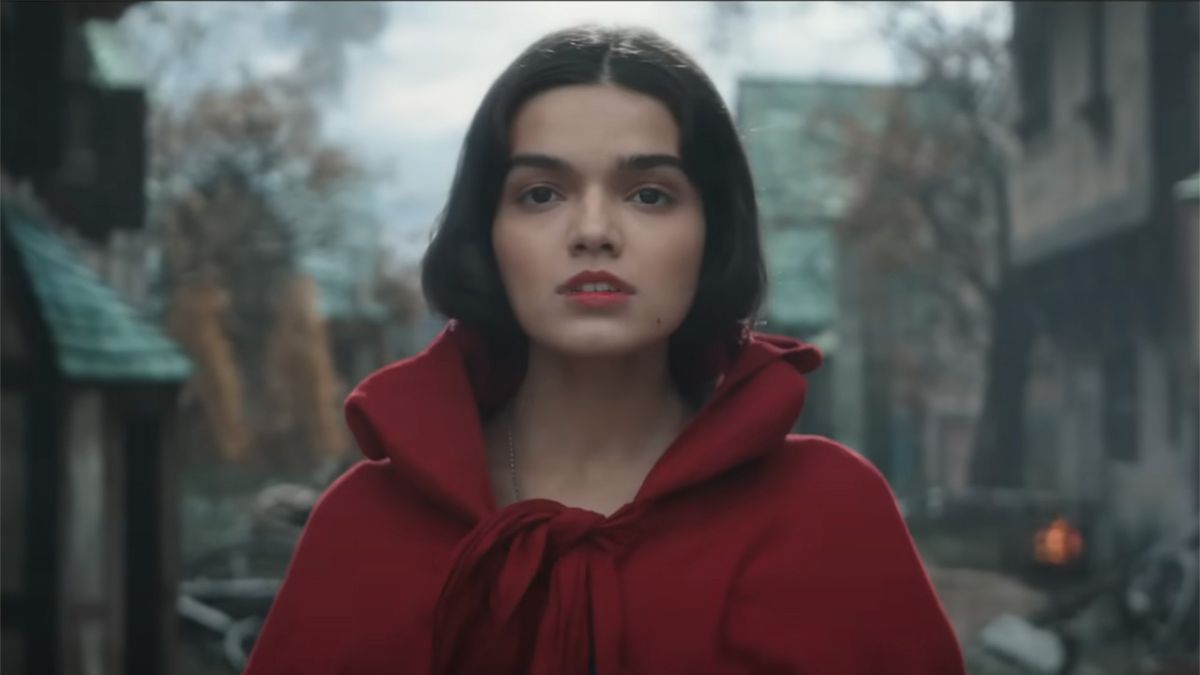 Rachel Zegler in red lipstick and a red cloak for Disney&#039;s Live Action Snow White remake.