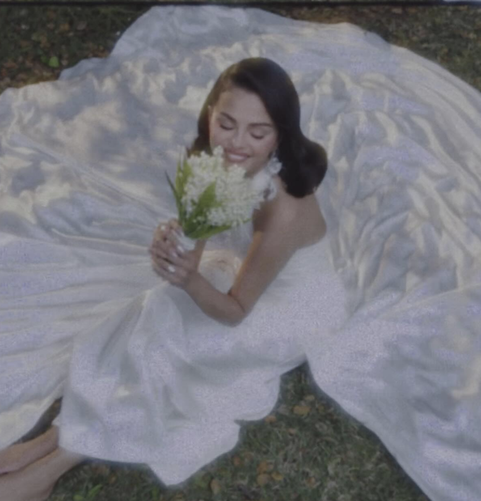 Selena Gomez wearing a white wedding dress