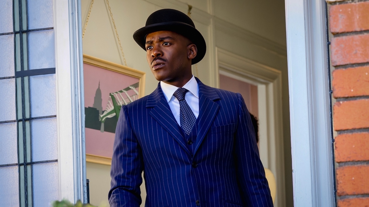 Ncuti Gatwa&#039;s Fifteenth Doctor dressed in blue pinstripe suit and wearing a bowler hat