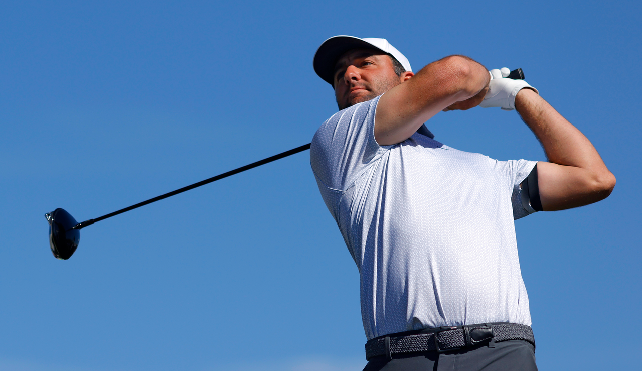 Scottie Scheffler hits a driver off the tee