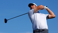 Scottie Scheffler hits a driver off the tee