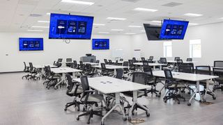 A classroom in the Bahamas uses AVoIP solutions from Extron to bring monitors to life. 