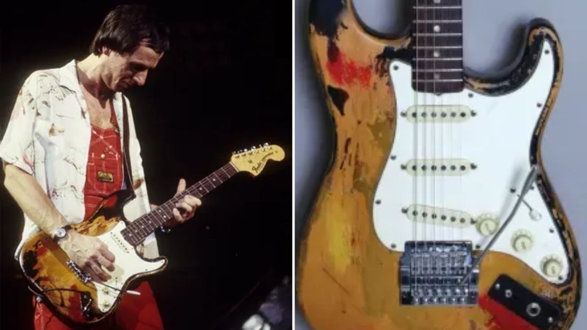 Adrian Belew performs onstage (left), his partially burned Strat