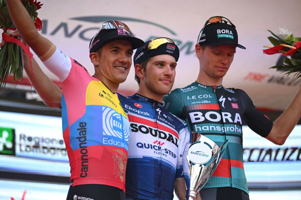 VARESE ITALY OCTOBER 03 LR Richard Carapaz of Ecuador and EF EducationEasyPost on second place race winner Ilan Van Wilder of Belgium and Team Soudal Quick Step and Aleksandr Vlasov of Russia and Team BORA hansgrohe on third place pose on the podium ceremony after the 102nd Tre Valli Varesine 2023 a 19654km one day race from Busto Arsizio to Varese on October 03 2023 in Varese Italy Photo by Dario BelingheriGetty Images