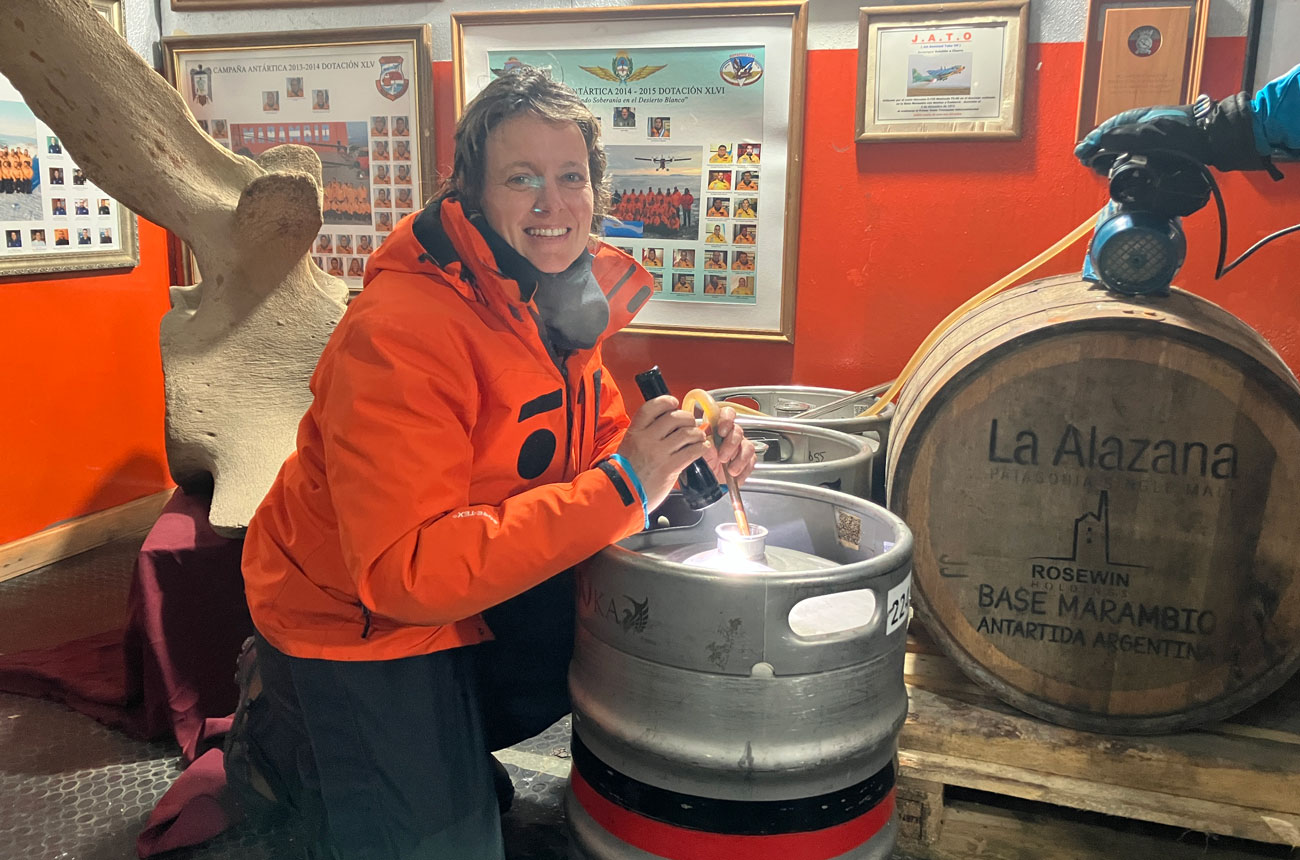 Distiller Lila Serenelli with the barrels of whisky at Base Marambio