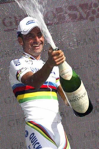 Paolo Bettini (Quick Step) once more shakes the 'World Champion curse' as well as the champagne.