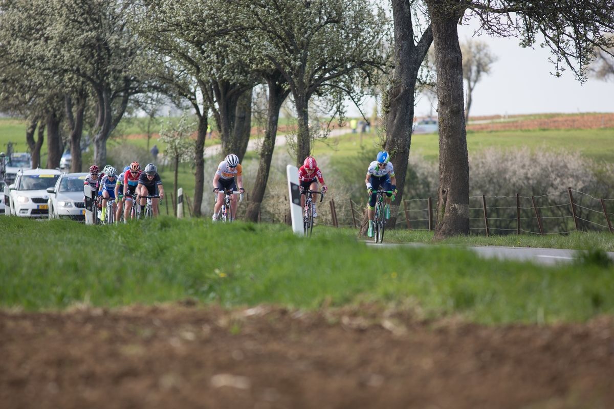 With one and a half laps to go, Katrin Garfoot (AUS) of Orica-AIS Cycling Team tries to bridge the gap to Niewiadoma during the second, 110.1km road race stage of Elsy Jacobs