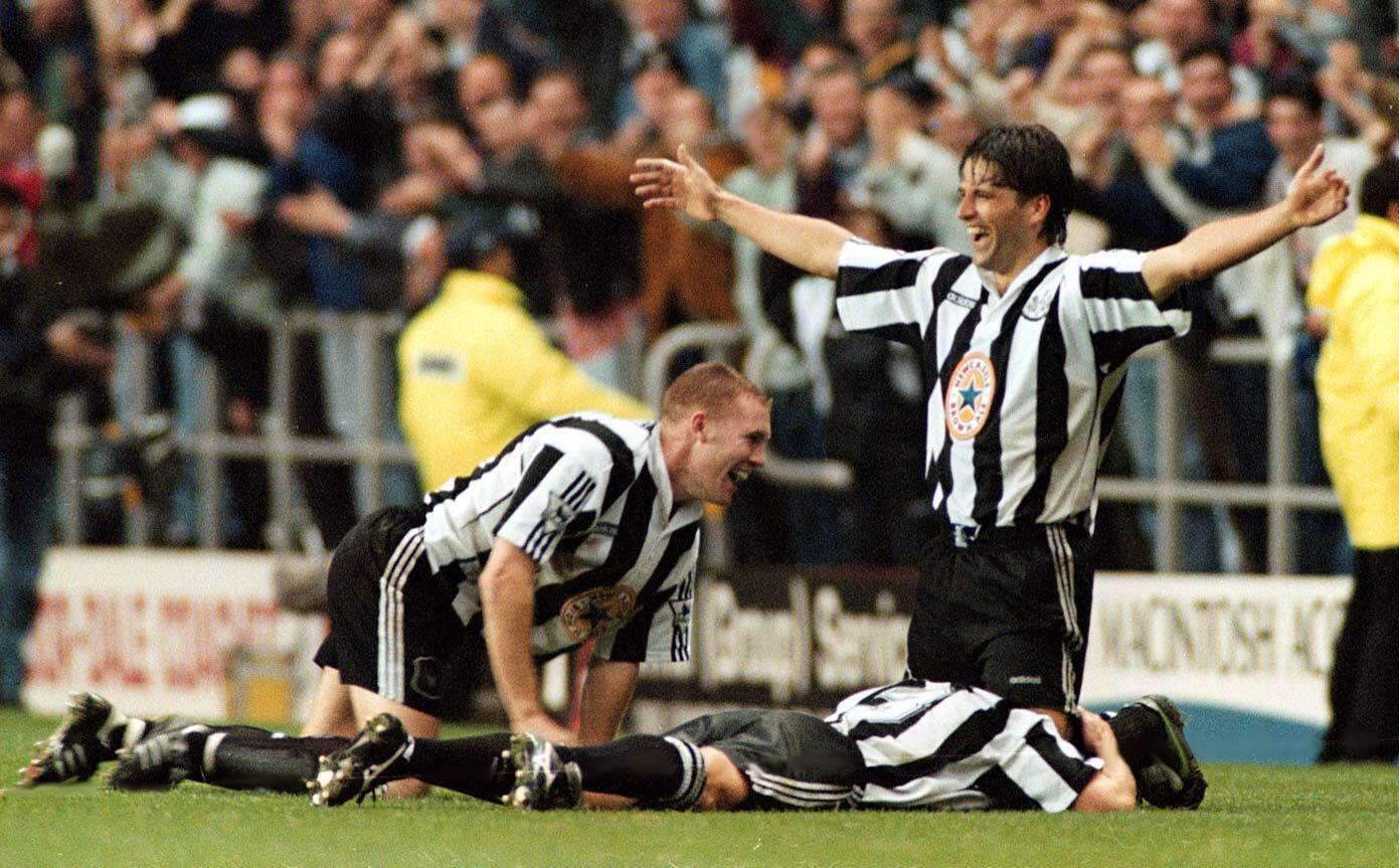 Newcastle United defender Philippe Albert celebrates his chip vs Manchester United and Peter Schmeichel in October 1996 with team-mates