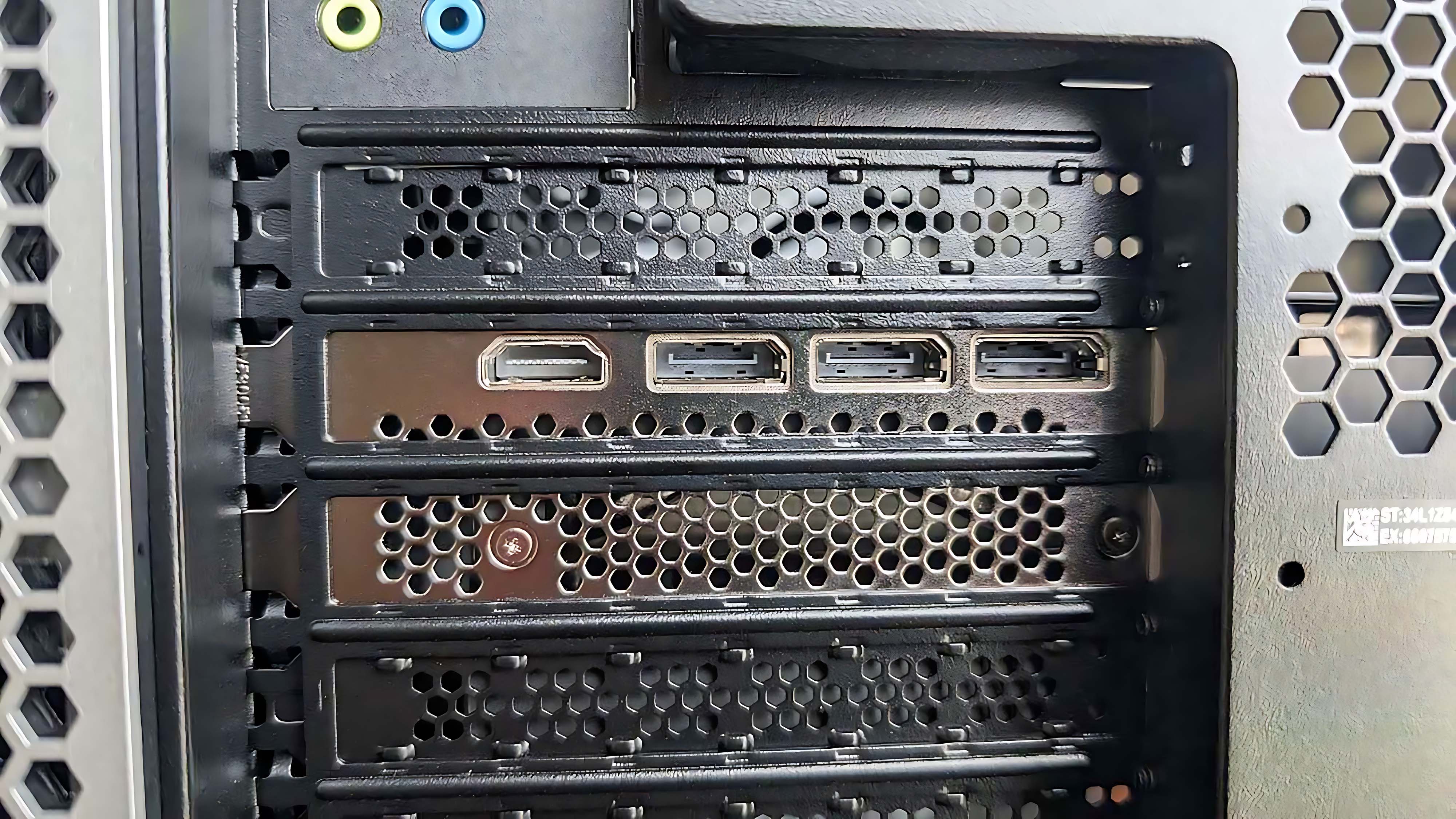 A closeup of the GPU display ports on the back of the Alienware Area-51 Gaming Desktop (2025).