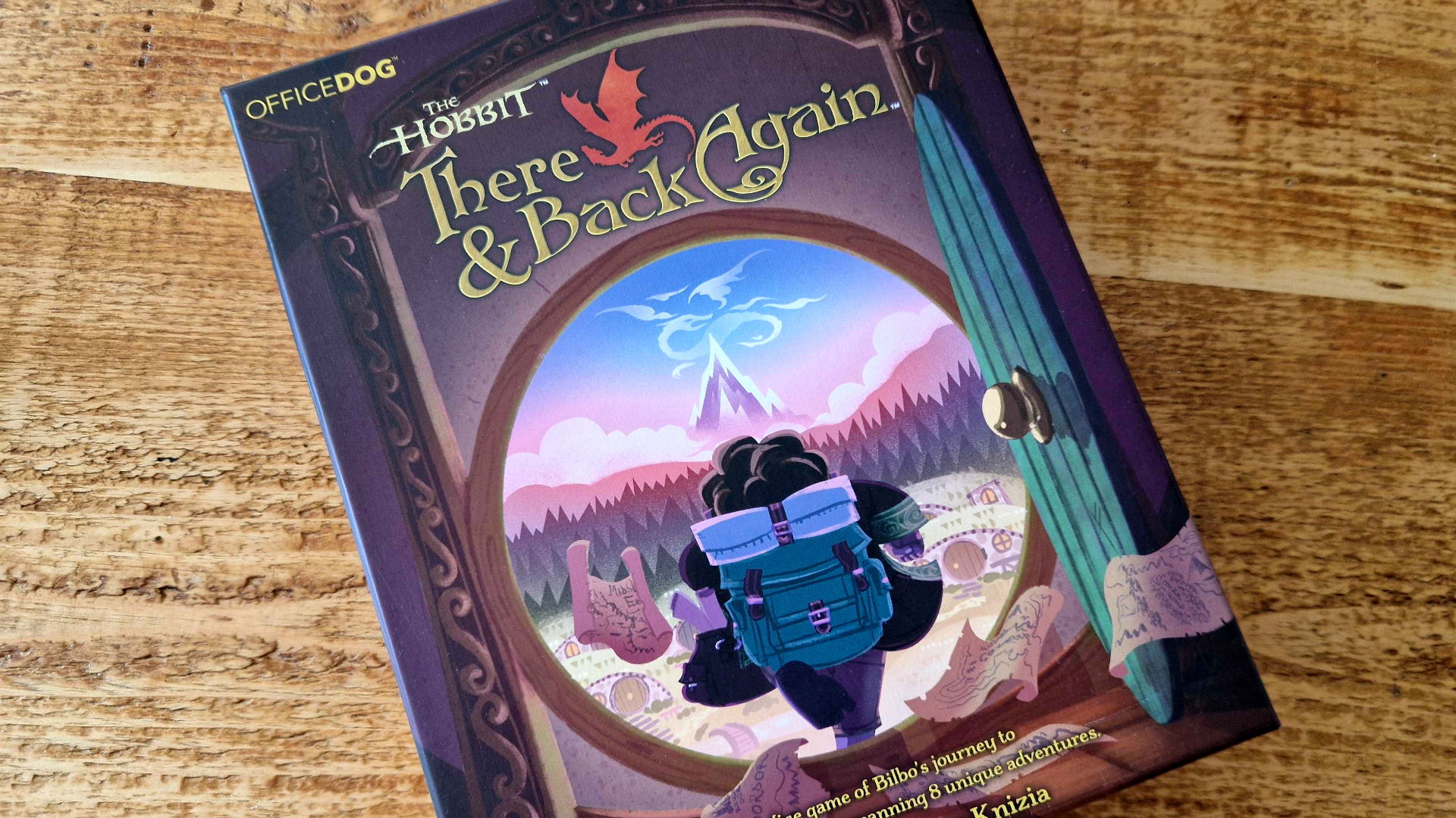 The Hobbit: There &amp;amp; Back Again components laid out on a wooden surface