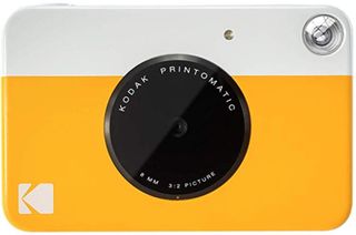Yellow Kodak Printomatic instant camera
