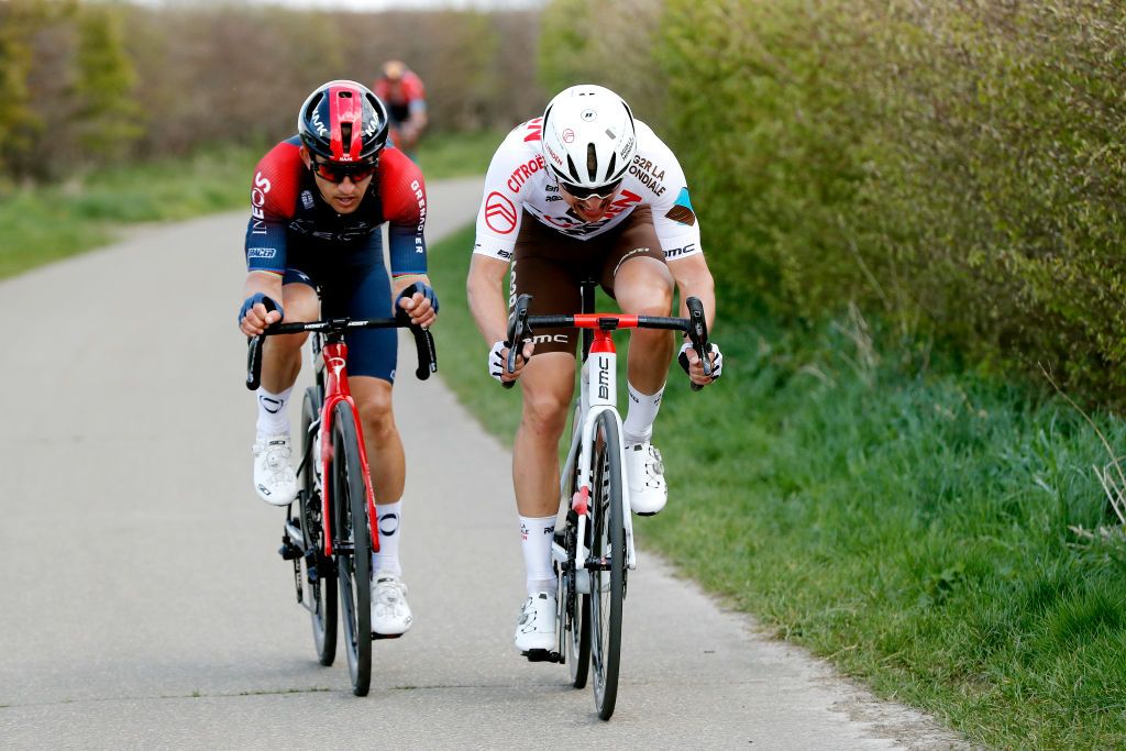VALKENBURG NETHERLANDS APRIL 10 LR Michal Kwiatkowski of Poland and Team INEOS Grenadiers and Benoit Cosnefroy of France and AG2R Citren Team compete in the breakaway during the 56th Amstel Gold Race 2022 Mens Elite a 2541km one day race from Maastricht to Valkenburg AGR2022 WorldTour on April 10 2022 in Valkenburg Netherlands Photo by Bas CzerwinskiGetty Images