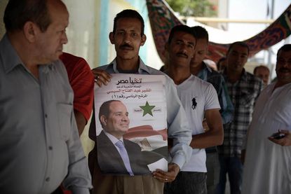 Egypt's Sisi wins the presidency easily, unsatisfactorily