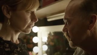 Amy Ryan as Sylvia talking to Michael Keaton as Riggan in his backstage dressing room in Birdman