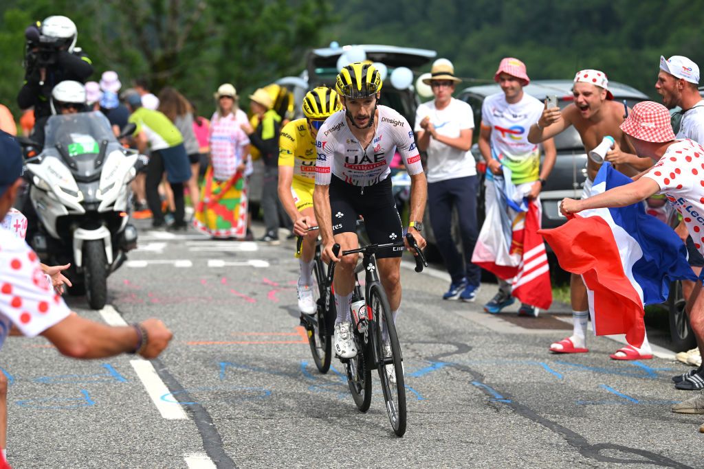 SAINTLARYSOULAN PLA DADET FRANCE JULY 13 LR Tadej Pogacar of Slovenia Yellow Leader Jersey and Adam Yates of The United Kingdom and UAE Team Emirates attack during the 111th Tour de France 2024 Stage 14 a 1519km stage from Pau to SaintLarySoulan Pla dAdet 1653m UCIWT on July 13 2024 in SaintLarySoulan Pla dAdet France Photo by Dario BelingheriGetty Images