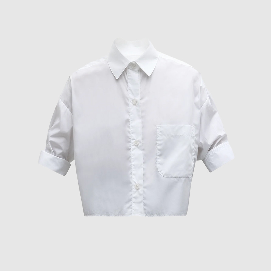 White short-sleeve collared shirt.