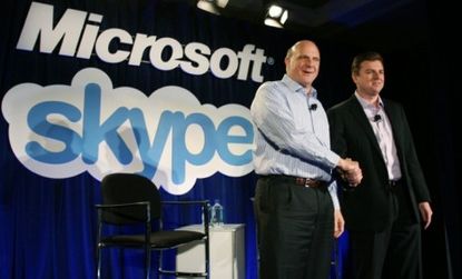 Microsoft CEO Steve Ballmer (left) shakes hands with Skype CEO Tony Bates Tuesday: Microsoft acquired Skype for a hefty $8.5 billion.