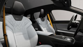 Grey seats and yellow seatbelts in car interior