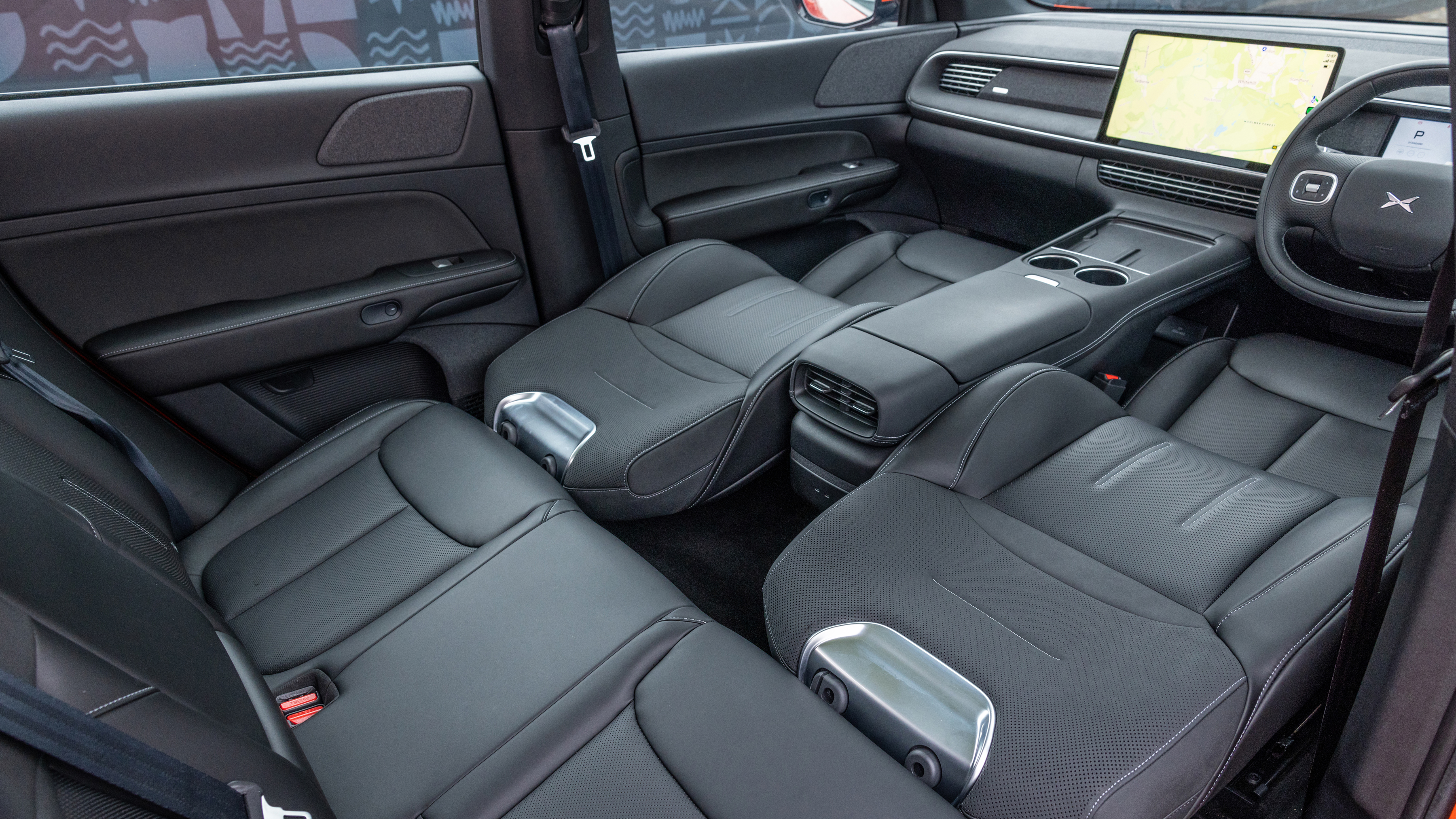 The interior of the Xpeng G6 with the seats laid flat