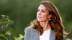 Kate Middleton wearing blazer and white tee