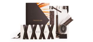 Timo Weiland branding. A bow tie acts as a container for the logo, while an oval – "a feminine shape", as Roanne Adams points out – houses the Timo Weiland monogram.